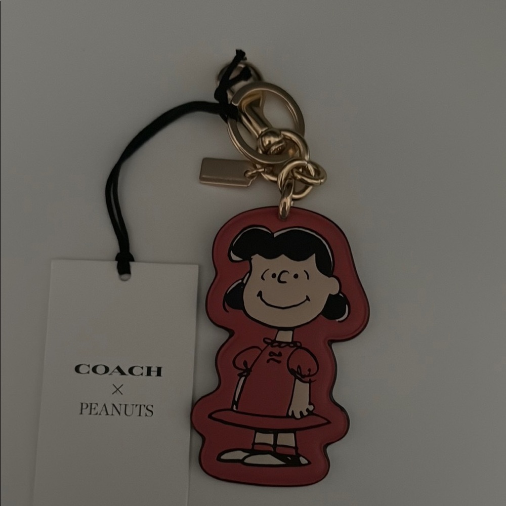 Coach x Peanuts Lucy in pink keychain New